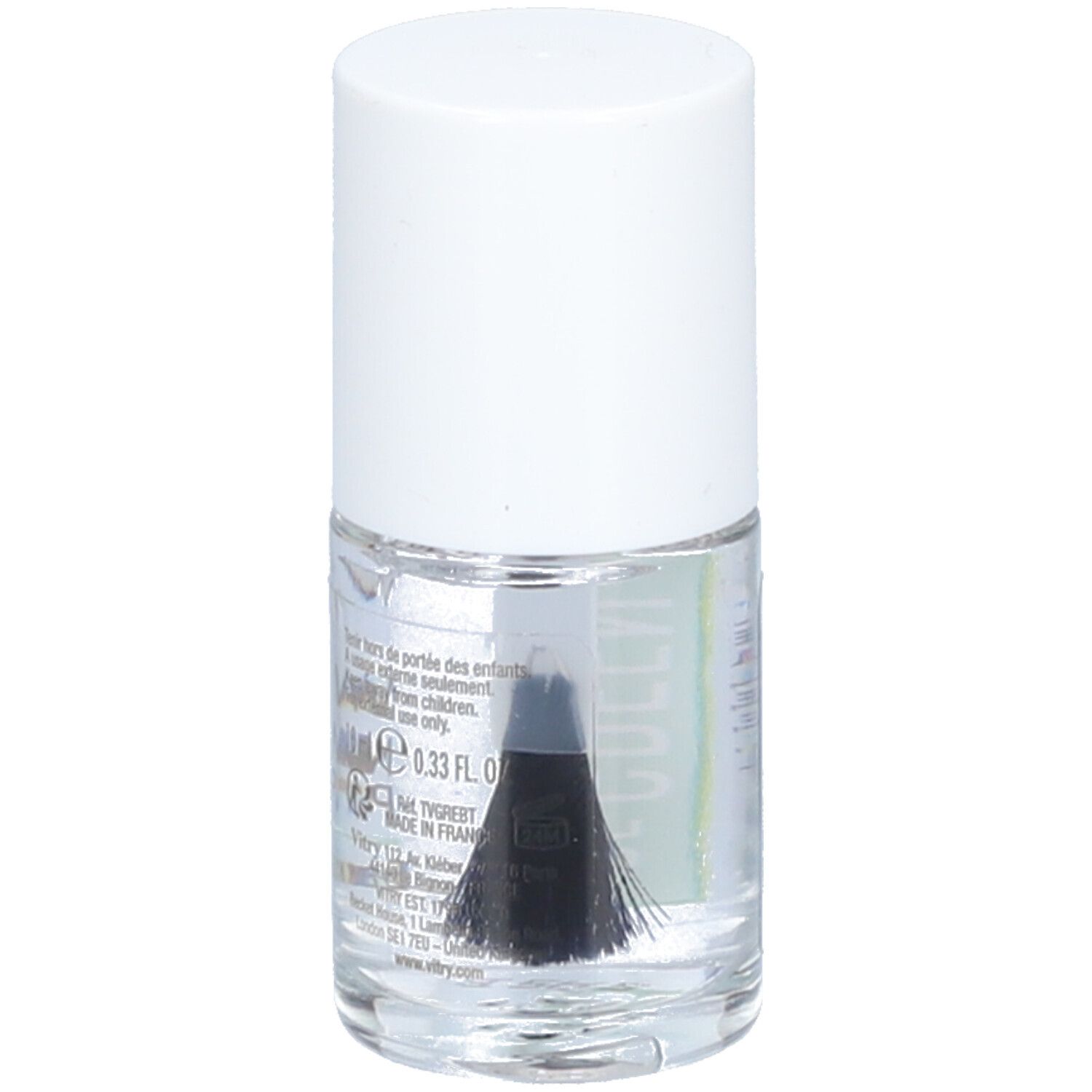 Klare Nagellackflasche mit weißem Deckel. Pinsel ist sichtbar. Etikett mit Inhaltsstoffen und Herstellerinformationen.
