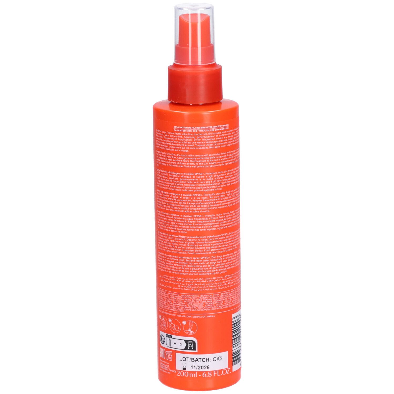 Dos du flacon spray orange. Texte avec informations produit et numéro de lot. Tête de pulvérisation rouge.