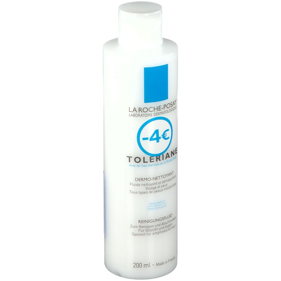 Flacon blanc avec étiquette bleue. Inscription: LA ROCHE-POSAY, TOLERIANE, fluide nettoyant. 200 ml. Bouchon en haut.