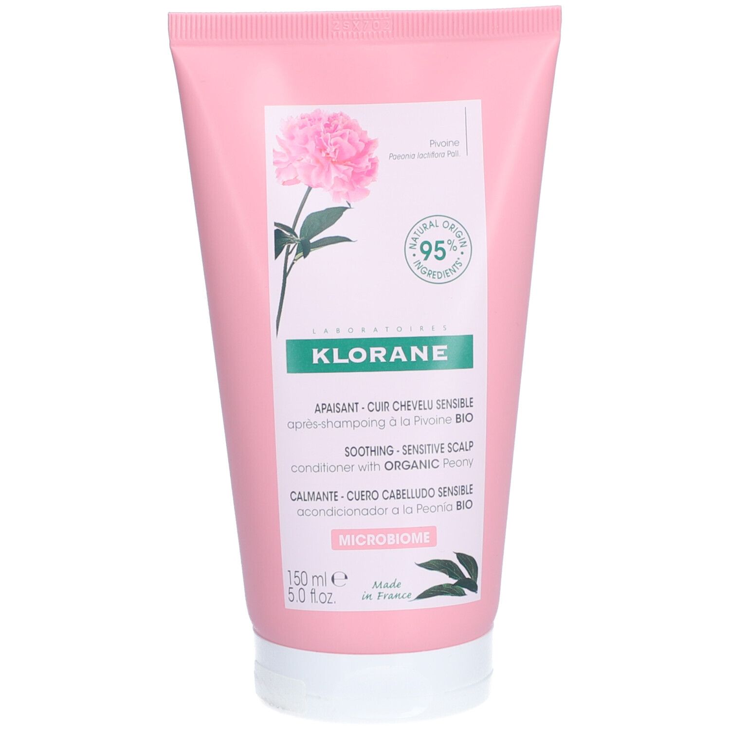 Tube rose KLORANE avec pivoine. Inscription : "APAIANT - CUIR CHEVELU SENSIBLE". Ingrédients naturels à 95%.