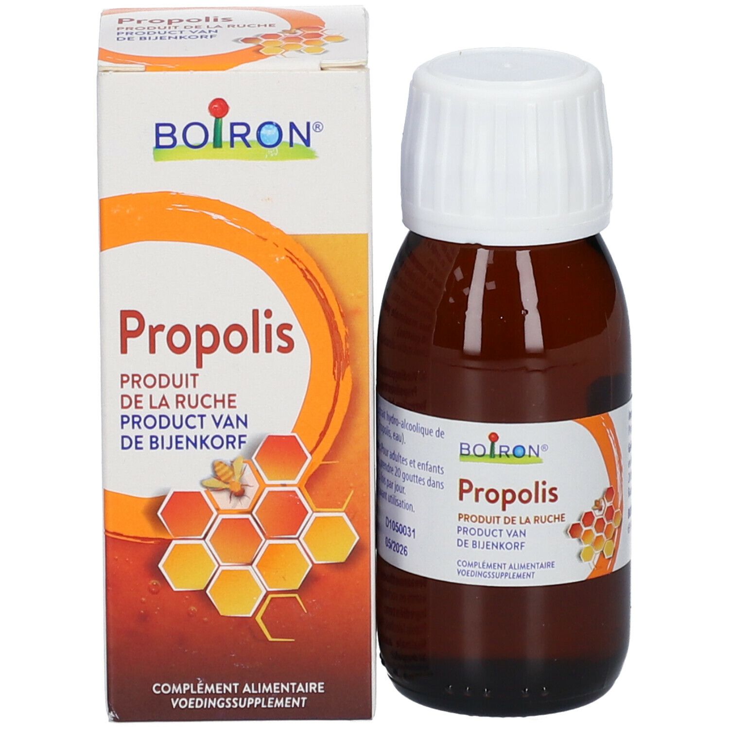 Bruine glazen fles met witte dop en verpakking. Opschrift: Boiron Propolis. Product van de bijenkorf.