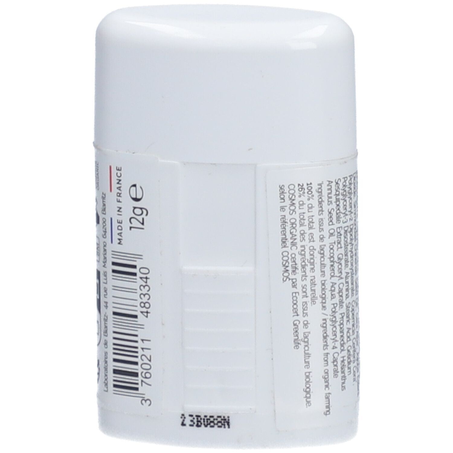 Dos du stick solaire blanc. Contient des informations sur les ingrédients et le poids: 12g.