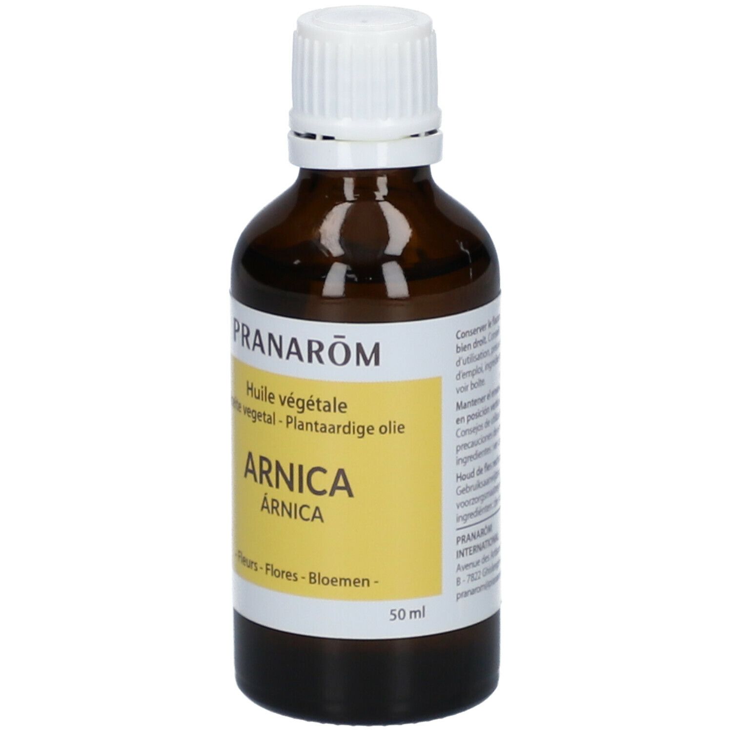 Bruine glazen fles met witte dop. Etiket: "PRANARÔM Huile végétale ARNICA".