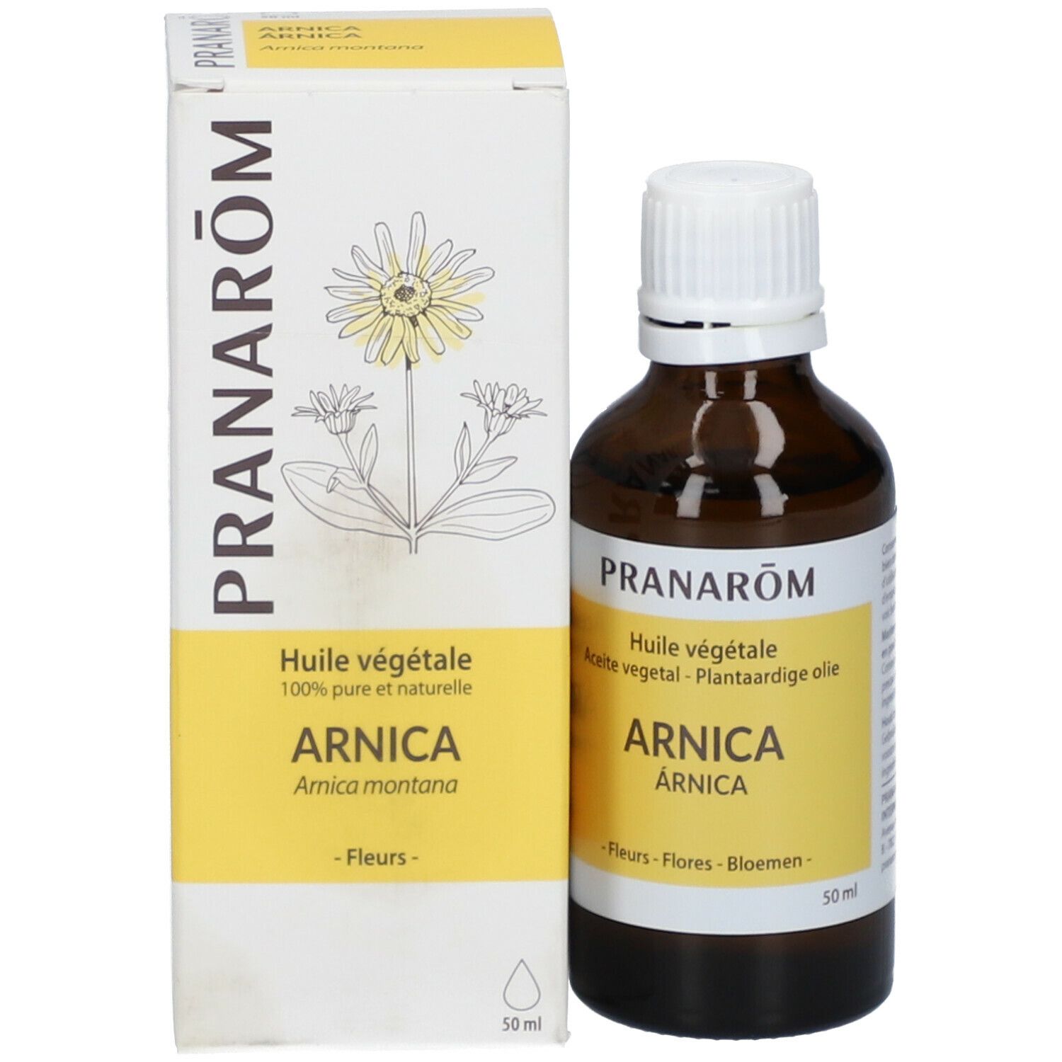 Bruine glazen fles met witte dop en doos. Etiket: "PRANARÔM Huile végétale ARNICA".