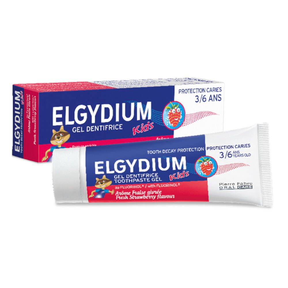 Tandpastatube en -doos. Blauwe tube met rode accenten, tekst: ELGYDIUM Kids, aardbeiensmaak. Doos met hetzelfde ontwerp.