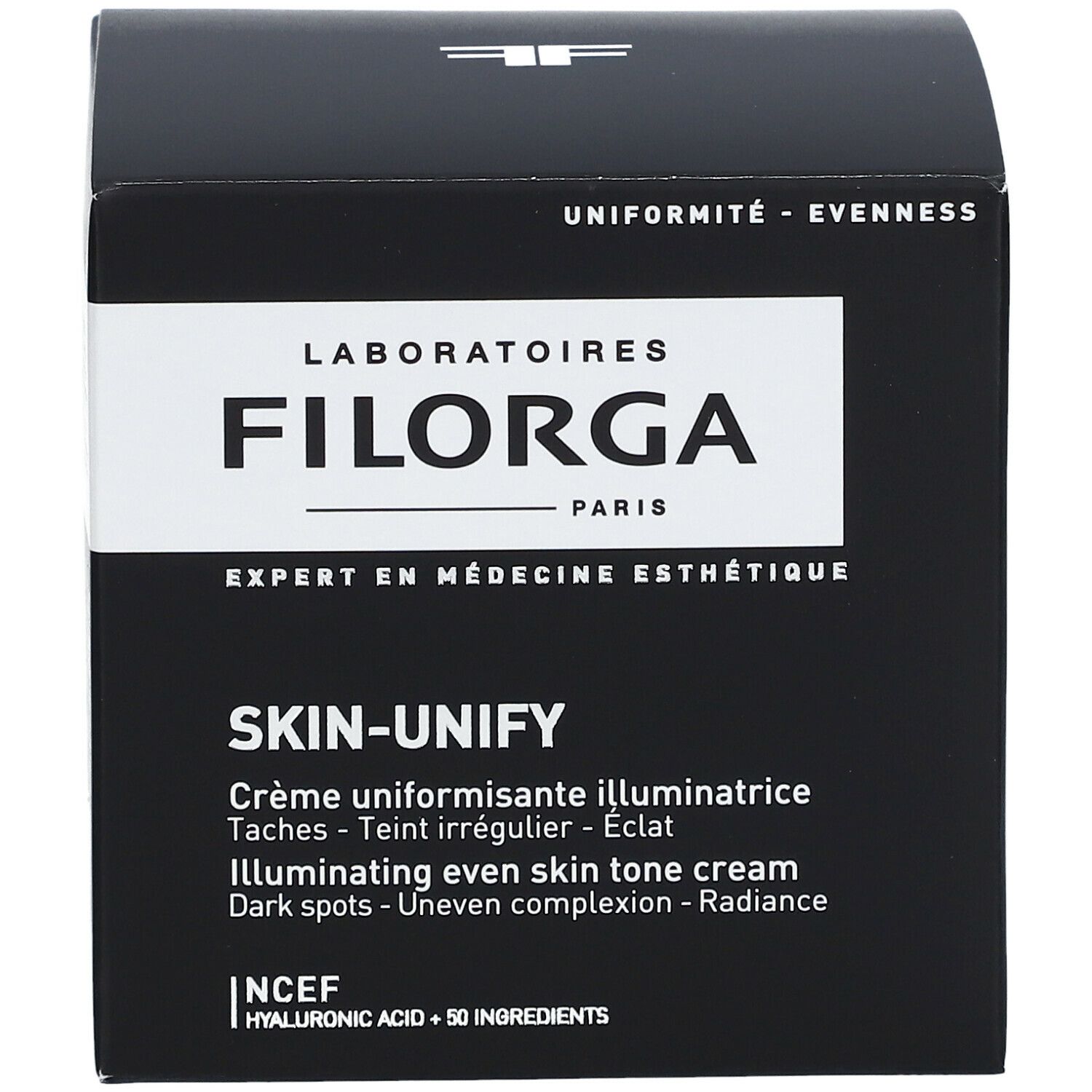 Zwarte doos met productinformatie. Opschrift: FILORGA, SKIN-UNIFY, Crème uniformisante illuminatrice.