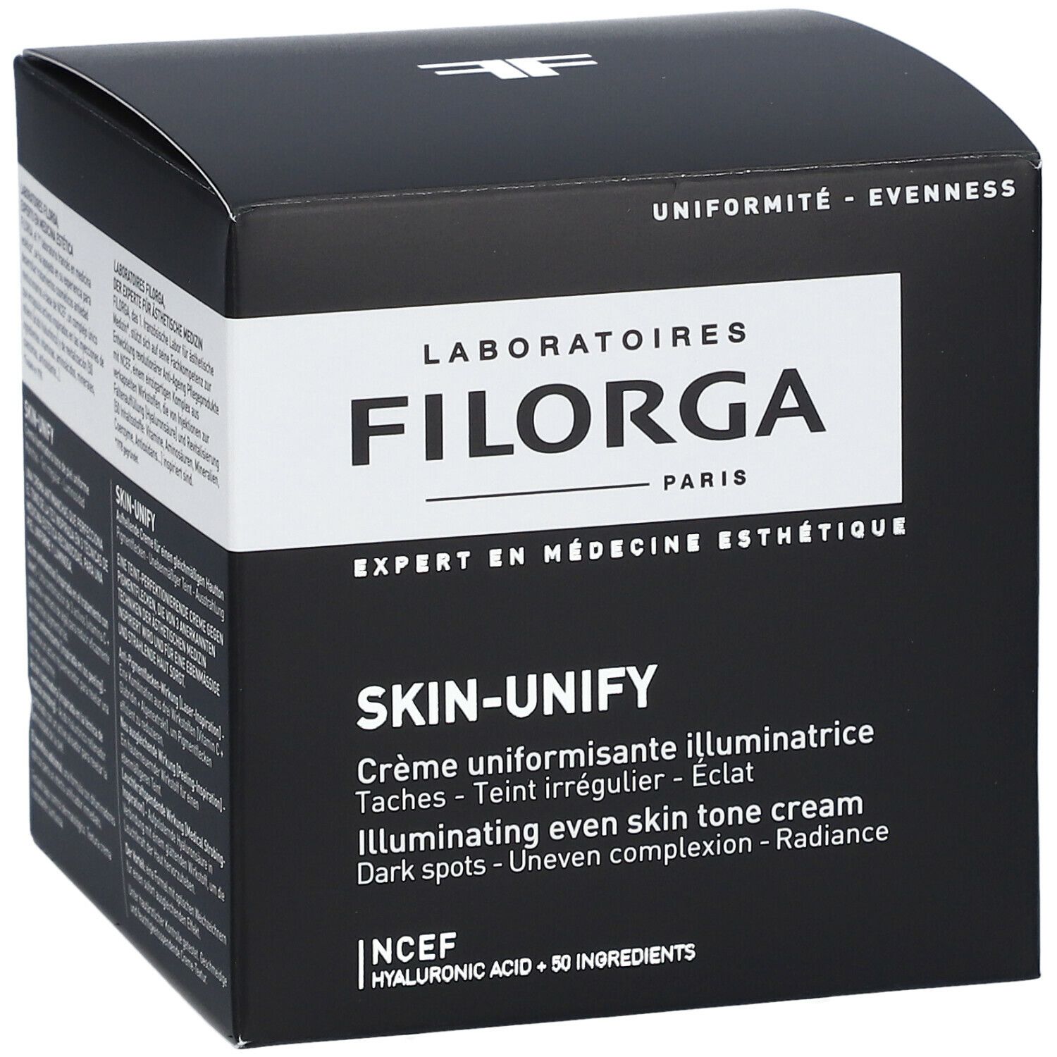 Zwarte doos met productinformatie. Opschrift: FILORGA, SKIN-UNIFY, Crème uniformisante illuminatrice.