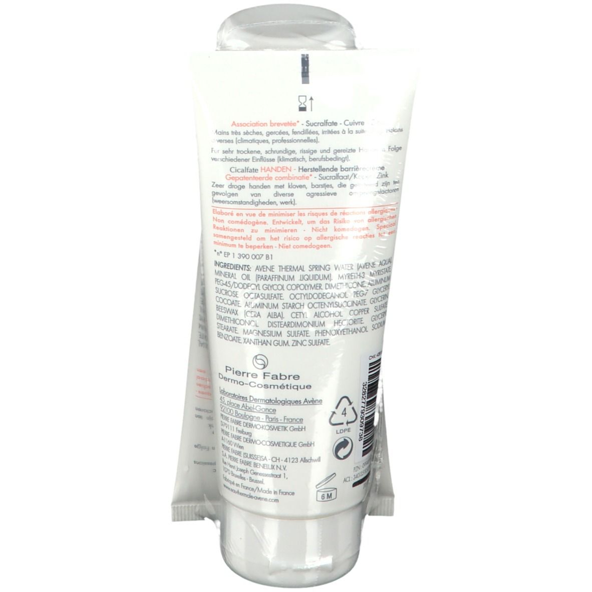 Dos du tube blanc. Texte multilingue. Ingrédients et informations du fabricant visibles.