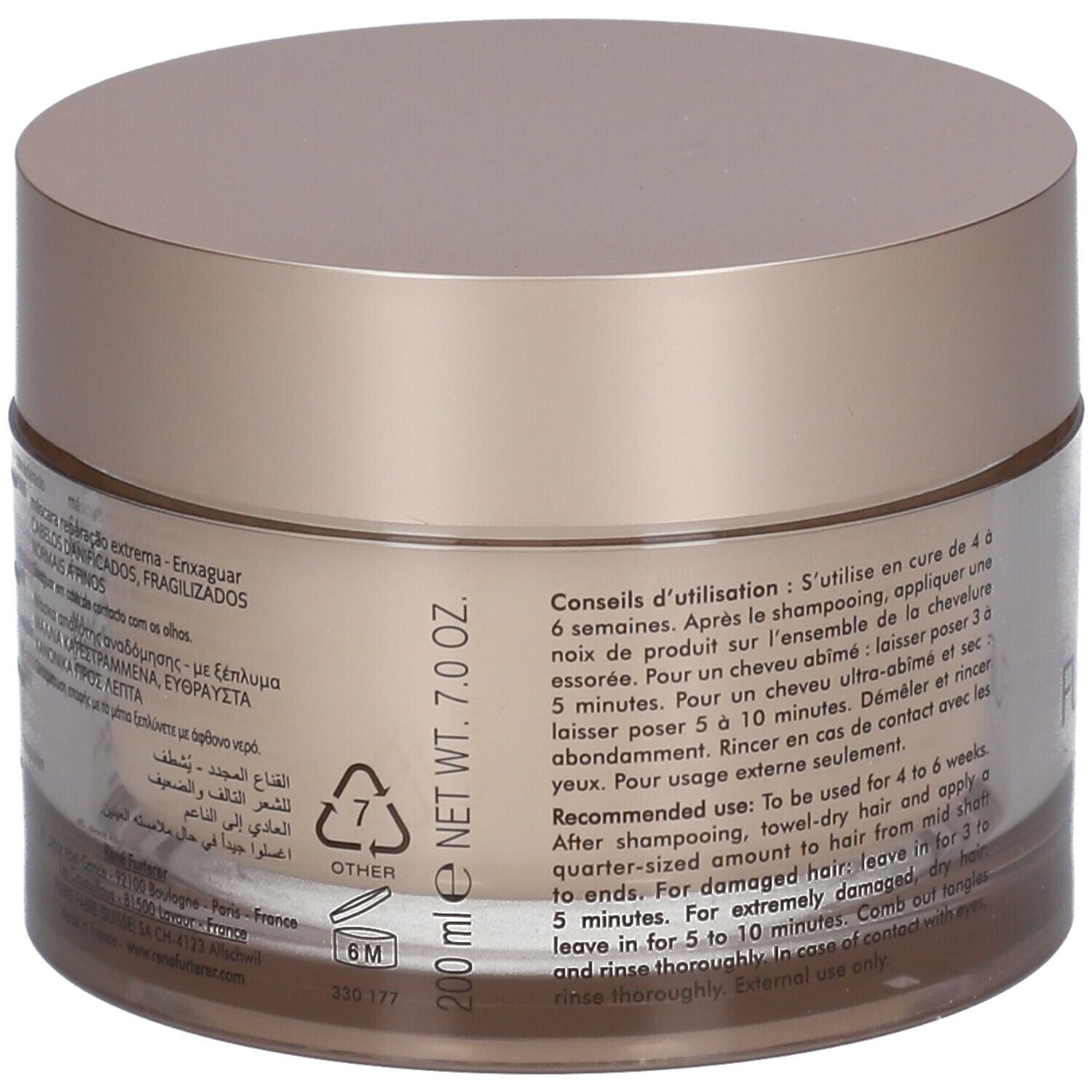 Achterkant van de beige pot met deksel. Tekst in meerdere talen. Nettogewicht: 200 ml / 7.0 oz.