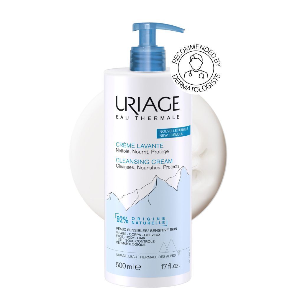 Witte dispenser met blauwe pomp, omringd door wit schuim. Aanbevolen door dermatologen.