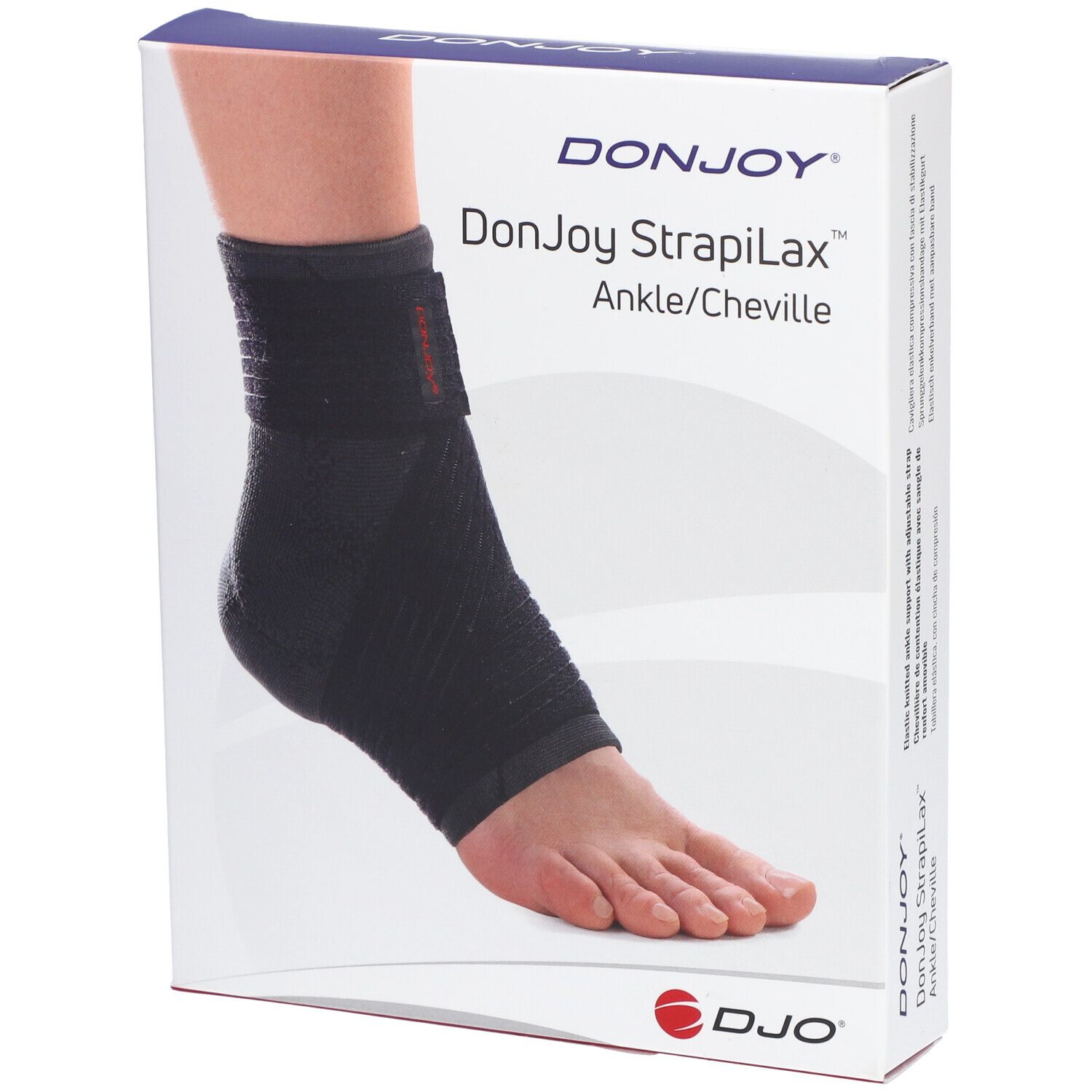 Boîte DonJoy Strapilax Cheville Enfant. Attelle de cheville noire sur un pied. Marque et nom du produit visibles.