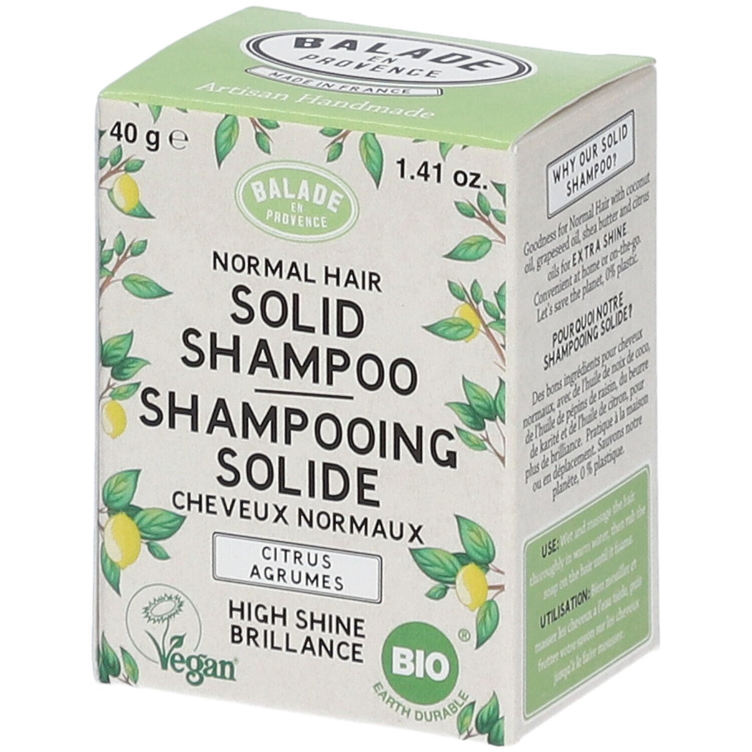 Grüne Schachtel mit Shampoo. Aufschrift: Balade en Provence, festes Shampoo für normales Haar, Citrus Agrumes, vegan, Bio-Siegel.