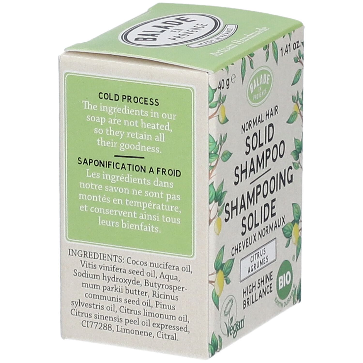 Grüne Schachtel mit Shampoo. Aufschrift: Balade en Provence, festes Shampoo für normales Haar, Citrus Agrumes, Inhaltsstoffe.