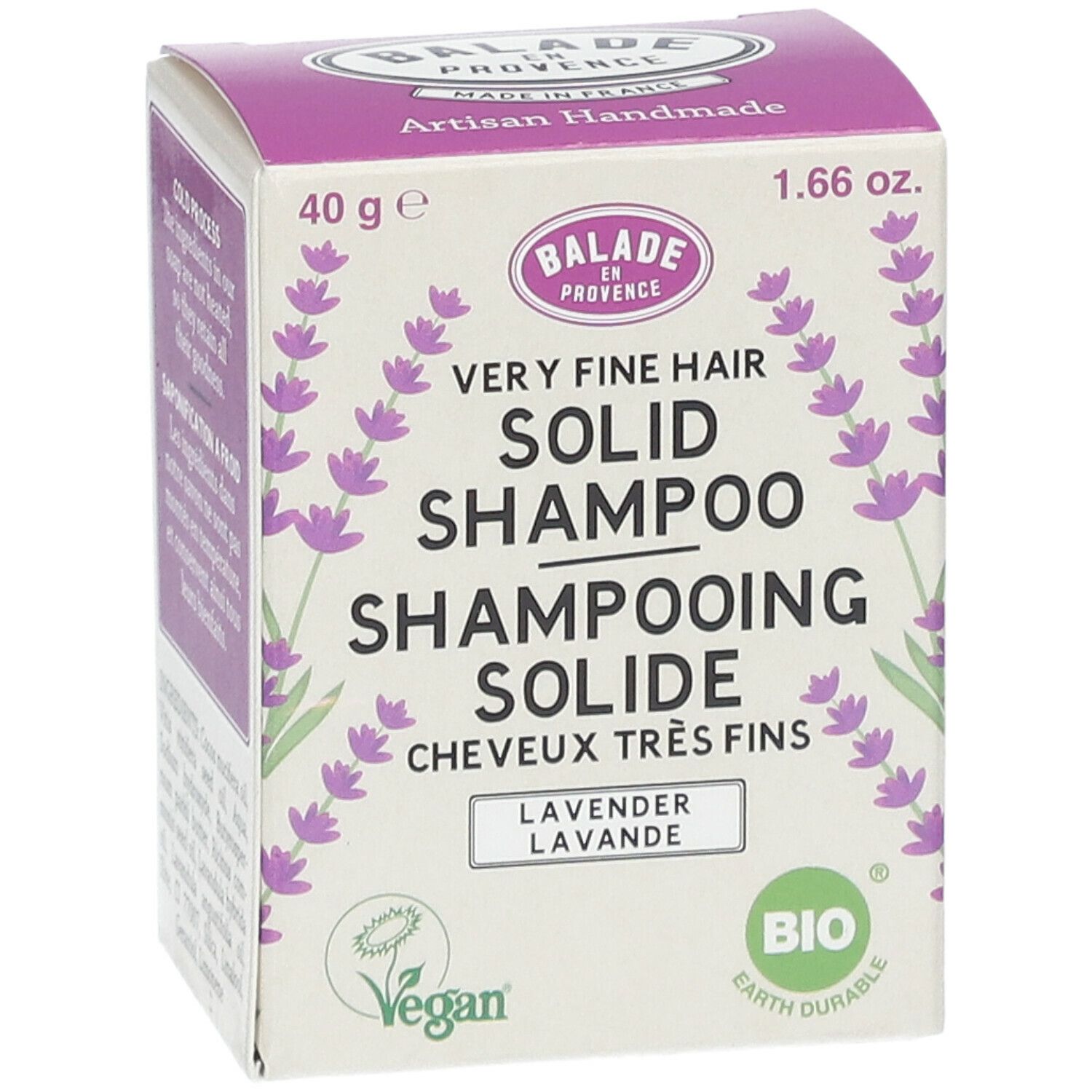 Paarse doos met vaste shampoo. Opschrift: Balade en Provence, zeer fijn haar, lavendel. Vegan- en bio-labels.