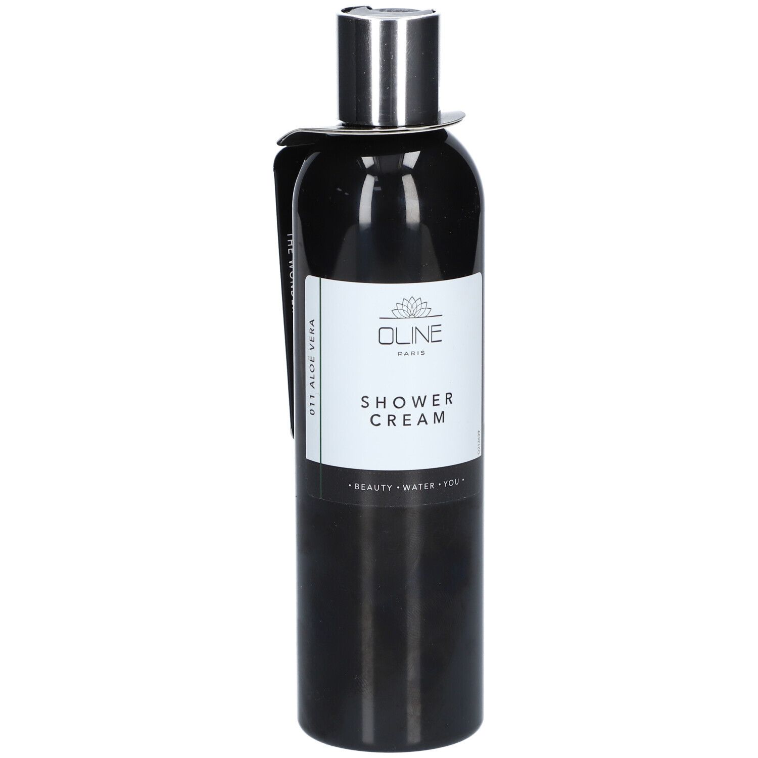 Zwarte fles met zilveren dop. Wit etiket met logo en "Shower Cream".