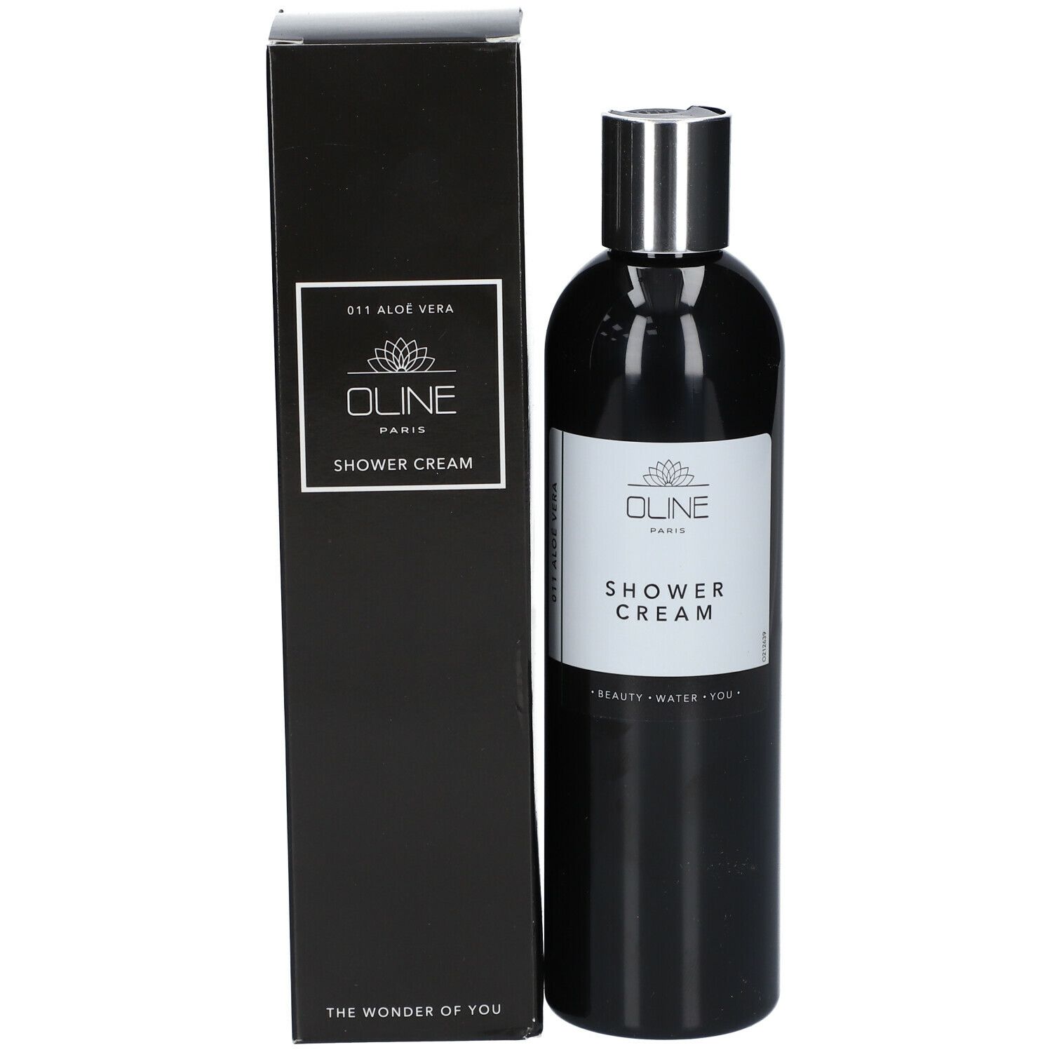 Zwarte fles en doos. Fles met "Shower Cream". Doos met logo en tekst.