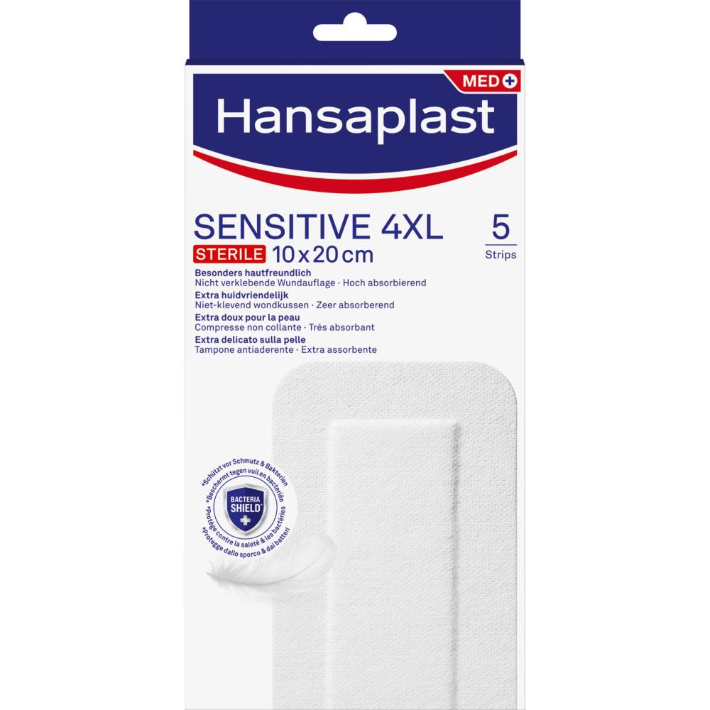 Verpakking van Hansaplast Sensitive 4XL steriel 10x20cm. Bevat 5 pleisters. Witte doos met productinfo.