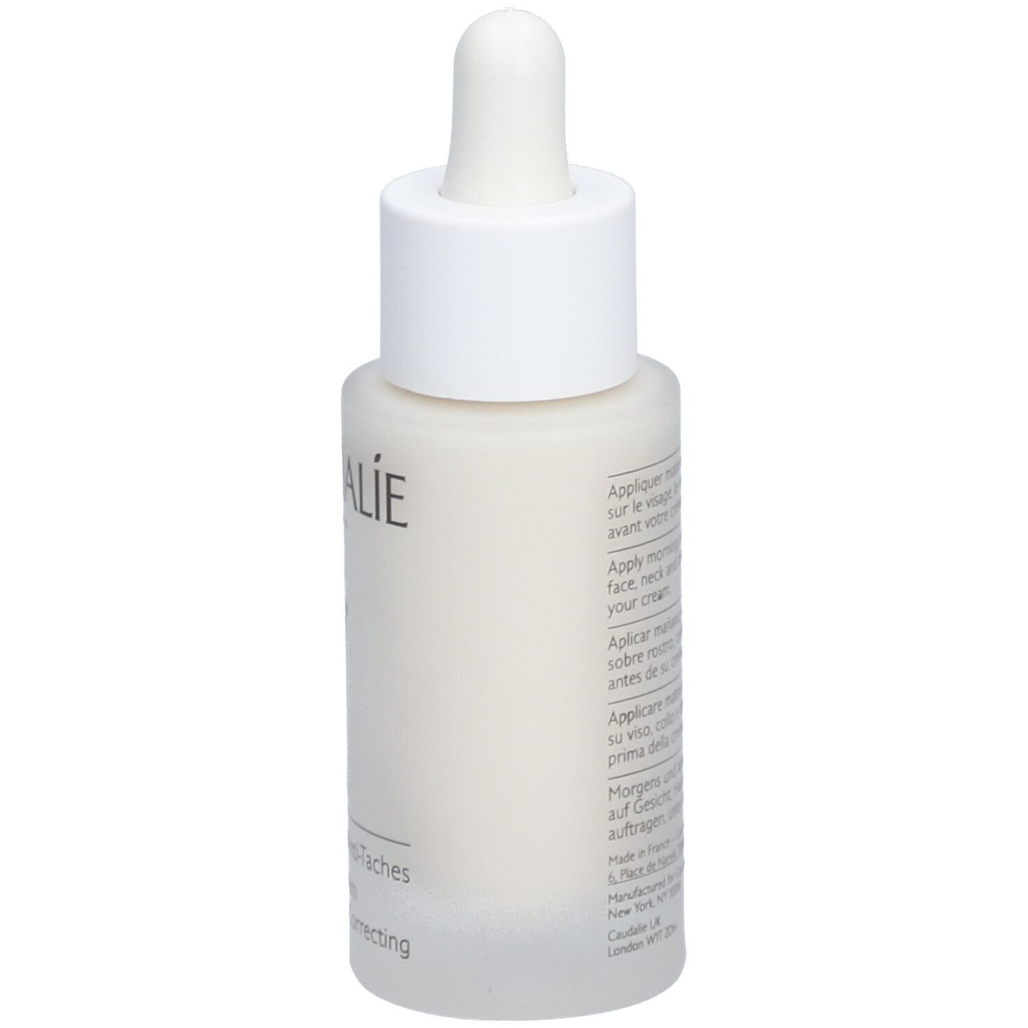 Rückseite der Caudalie Vinoperfect Sérum Éclat Flasche. Text mit Produktinformationen. Weiße Flasche mit weißem Deckel und Pipette.