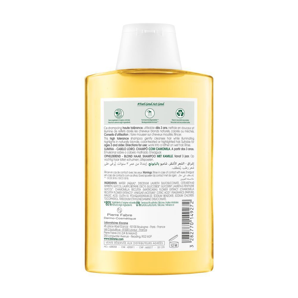 Shampooing KLORANE à la camomille. Flacon, vue latérale. Bouchon blanc, liquide jaune, étiquette.