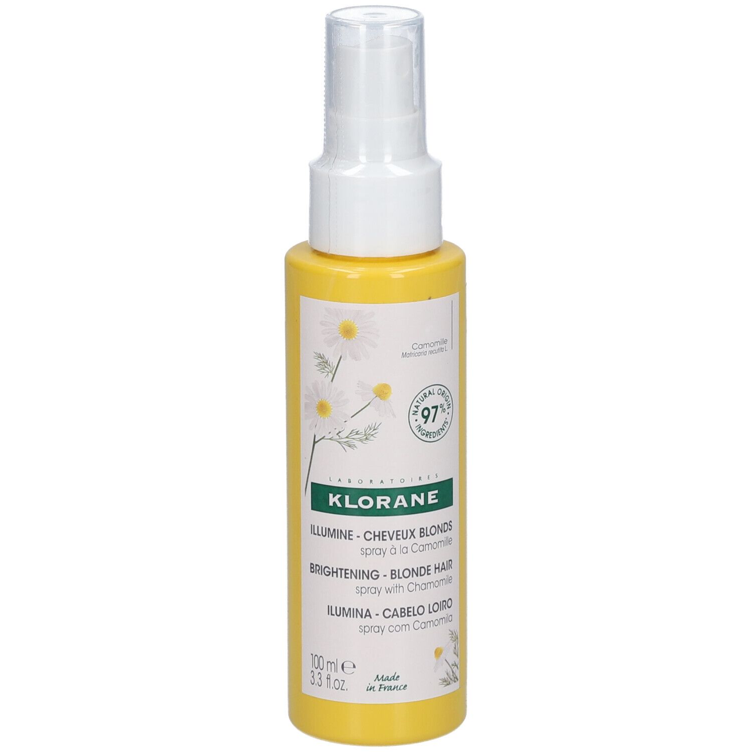 Gele fles met verstuiver. Opschrift: KLORANE, blonde haarverhelderende spray met kamille.