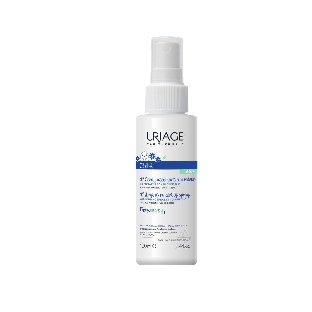 Spray blanc avec bouchon. Inscription: URIAGE, Bébé, 1° Spray asséchant réparateur. 100ml.