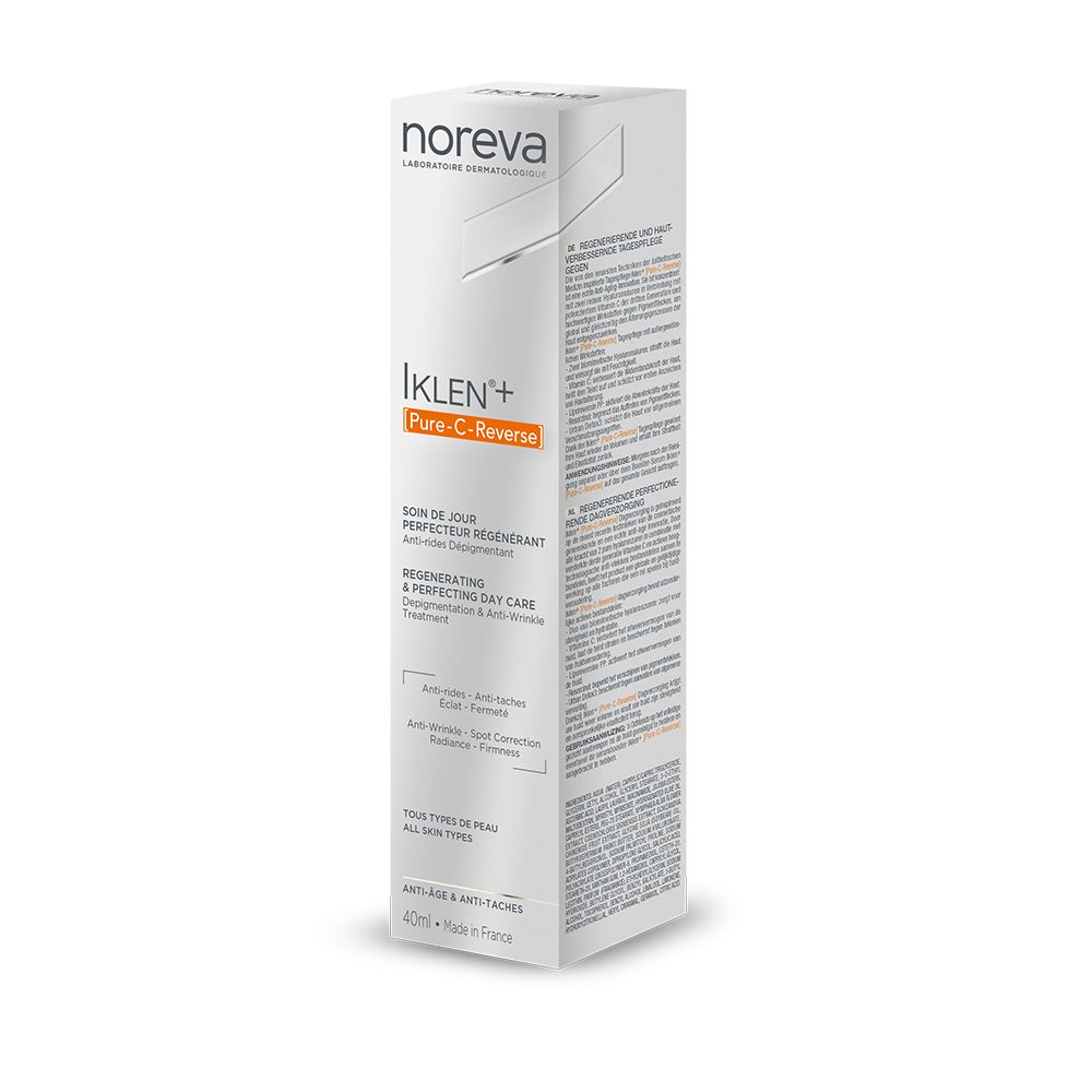 Witte doos met tekst: Noreva, IKLEN+ Pure-C-Reverse, Regenerating & Perfecting Day Care. Meertalige tekst.