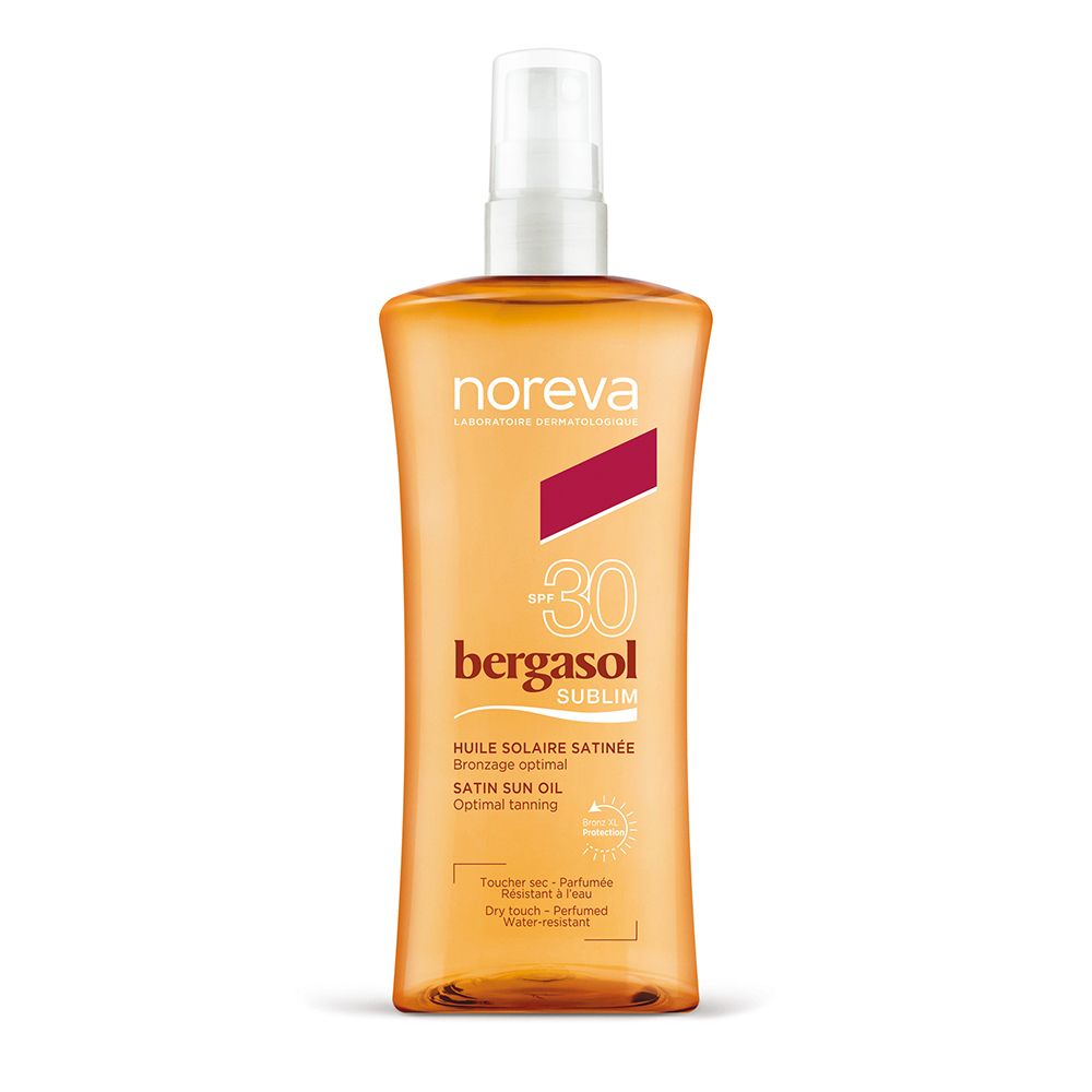 Noreva Bergasol Sun Oil SPF 30. Oranje fles met verstuiver. Productnaam en SPF-waarde duidelijk zichtbaar.