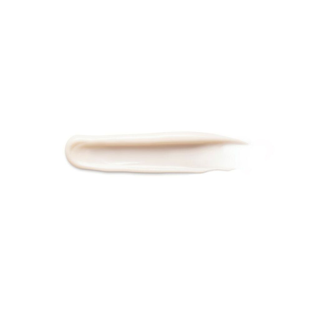 Crème-uitstrijkje op witte achtergrond. Crèmekleur.