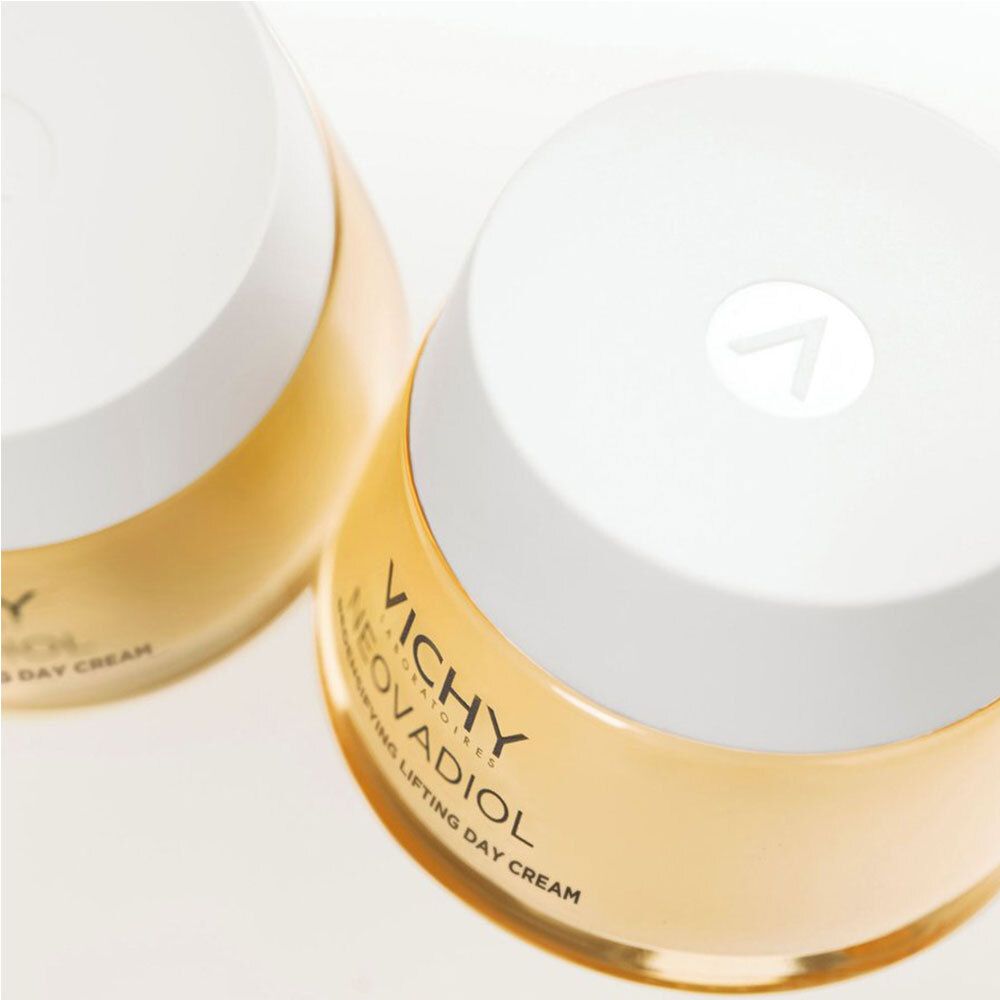 Twee crèmepotten met witte deksel. Opschrift: Vichy, Neovadiol, Redensifying Lifting Day Cream.