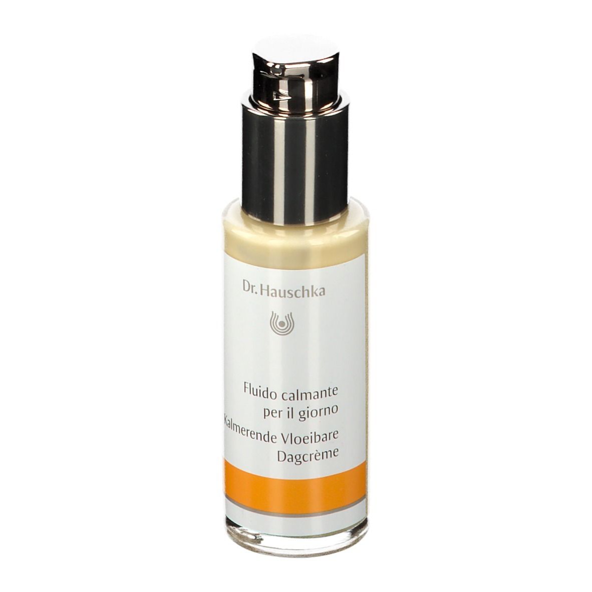 Beige fles met zilveren pomp. Etiket met tekst en oranje streep. Dr. Hauschka logo.