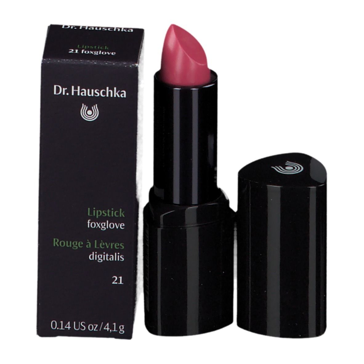 Lippenstift mit Verpackung. Schwarze Hülse, rosa Spitze. Text: Dr. Hauschka, Lipstick 21 foxglove.