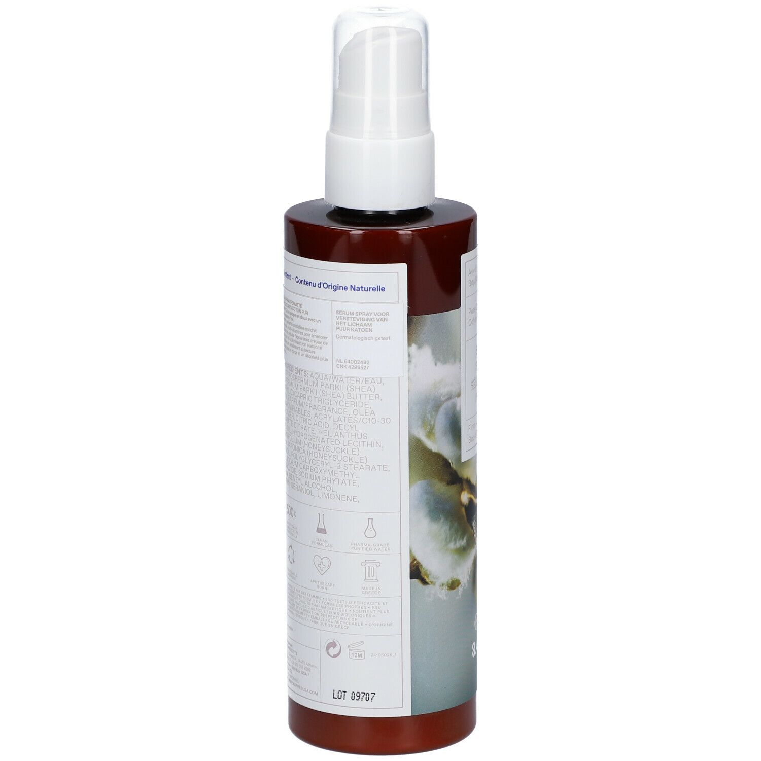 Achterkant KORRES Body Firming Serum Spray fles. Tekst met ingrediënten en info. Bruine fles met witte spraykop.