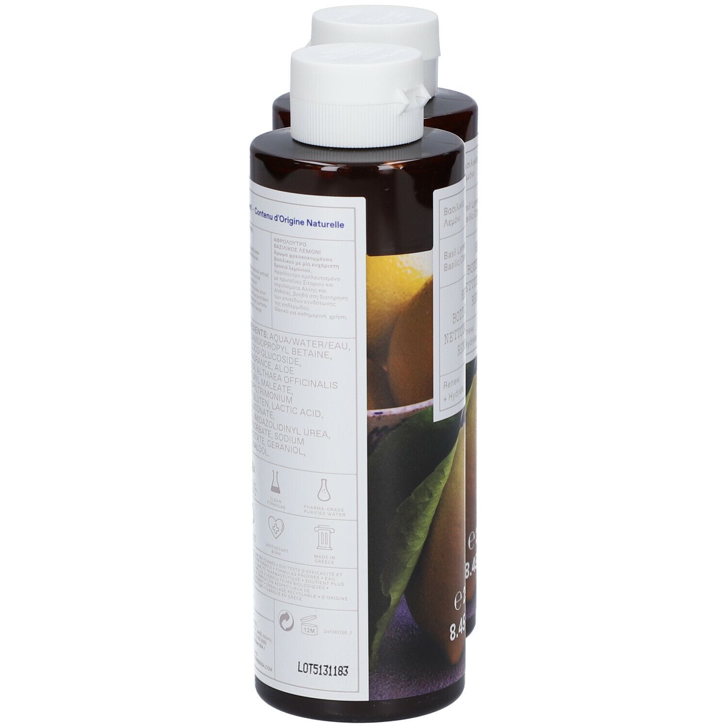 Twee flessen KORRES® Renewing Body Cleanser. Achteraanzicht met etiketten. Opschrift: Ingrediënten, 90,2% natuurlijke oorsprong.