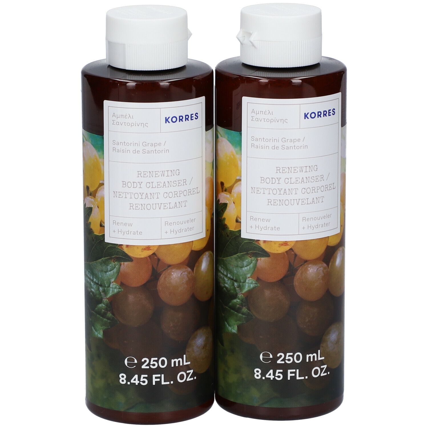 Deux flacons de nettoyant corporel KORRES. Flacons bruns avec étiquette et bouchon blancs. Illustration de raisins.
