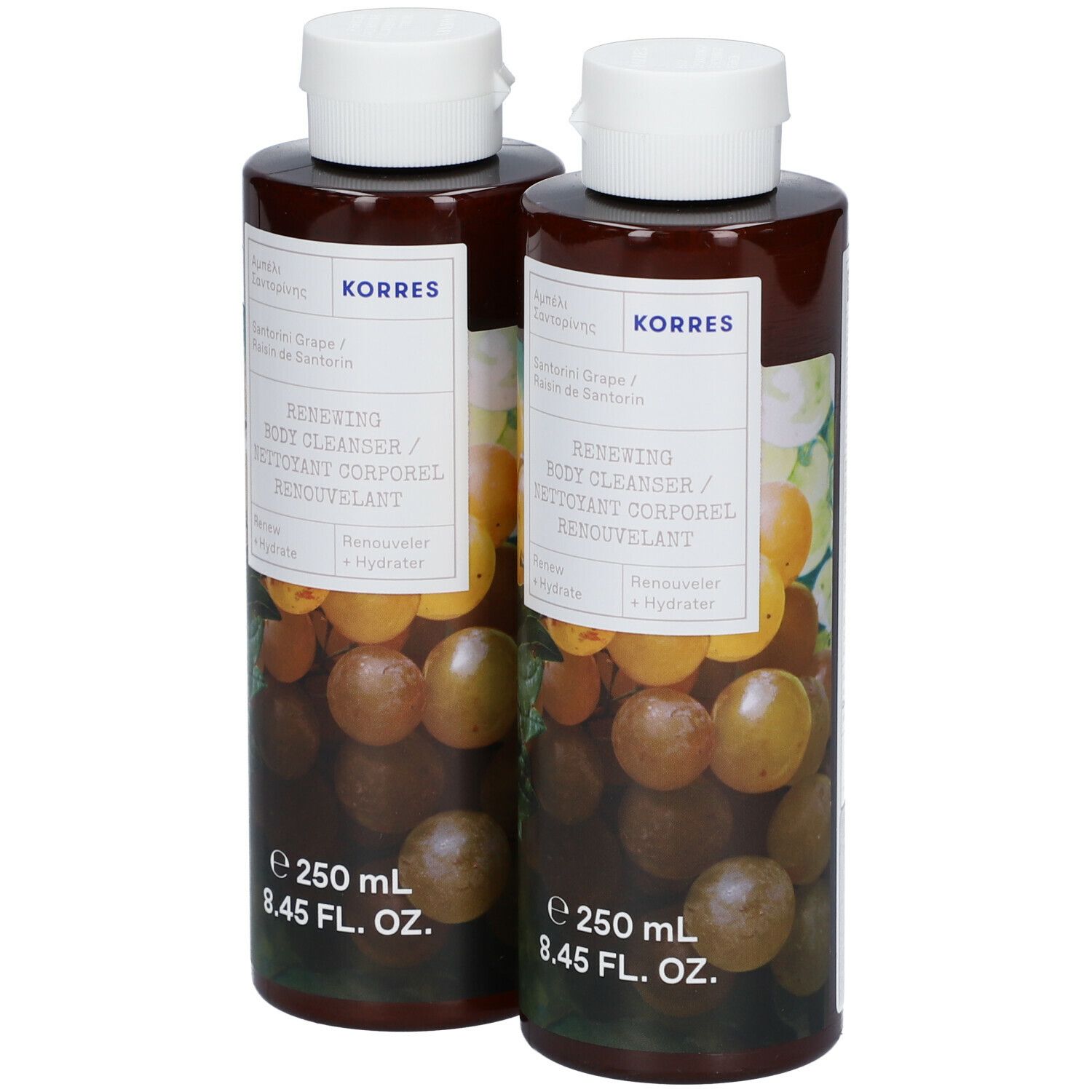 Deux flacons de nettoyant corporel KORRES. Flacons bruns avec étiquette et bouchon blancs. Illustration de raisins.