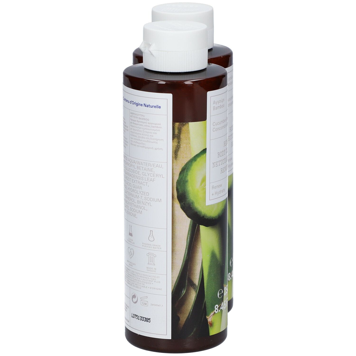 Twee flessen body cleanser, zijaanzicht. Opschrift: KORRES, Komkommer & Bamboe, Renewing Body Cleanser. Achterkant met ingrediënten.