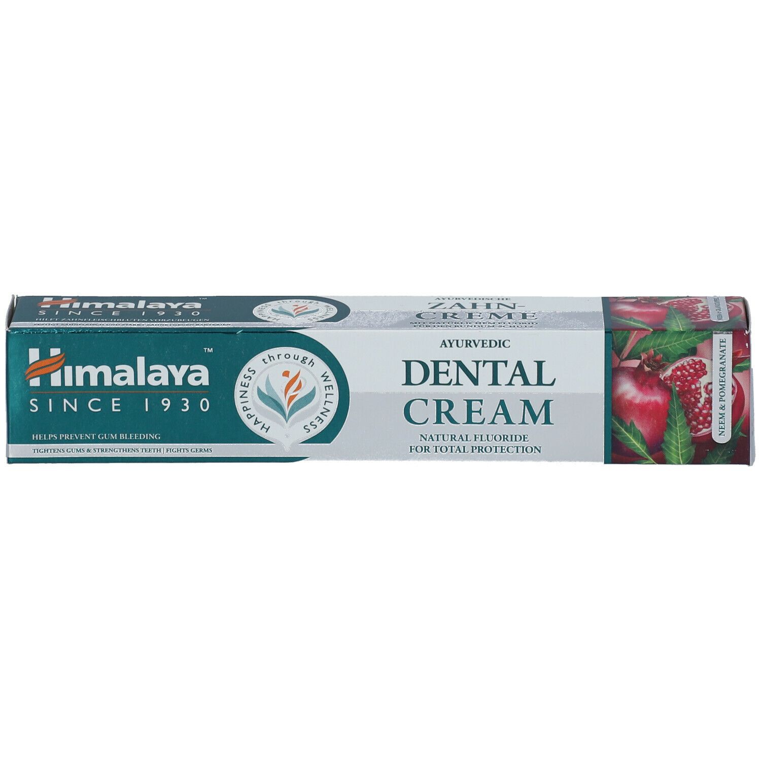 Schachtel, weiß, grün, rot. Text: Dental Cream, Himalaya. Abbildung von Granatapfel. Aufschrift: Zahncreme.