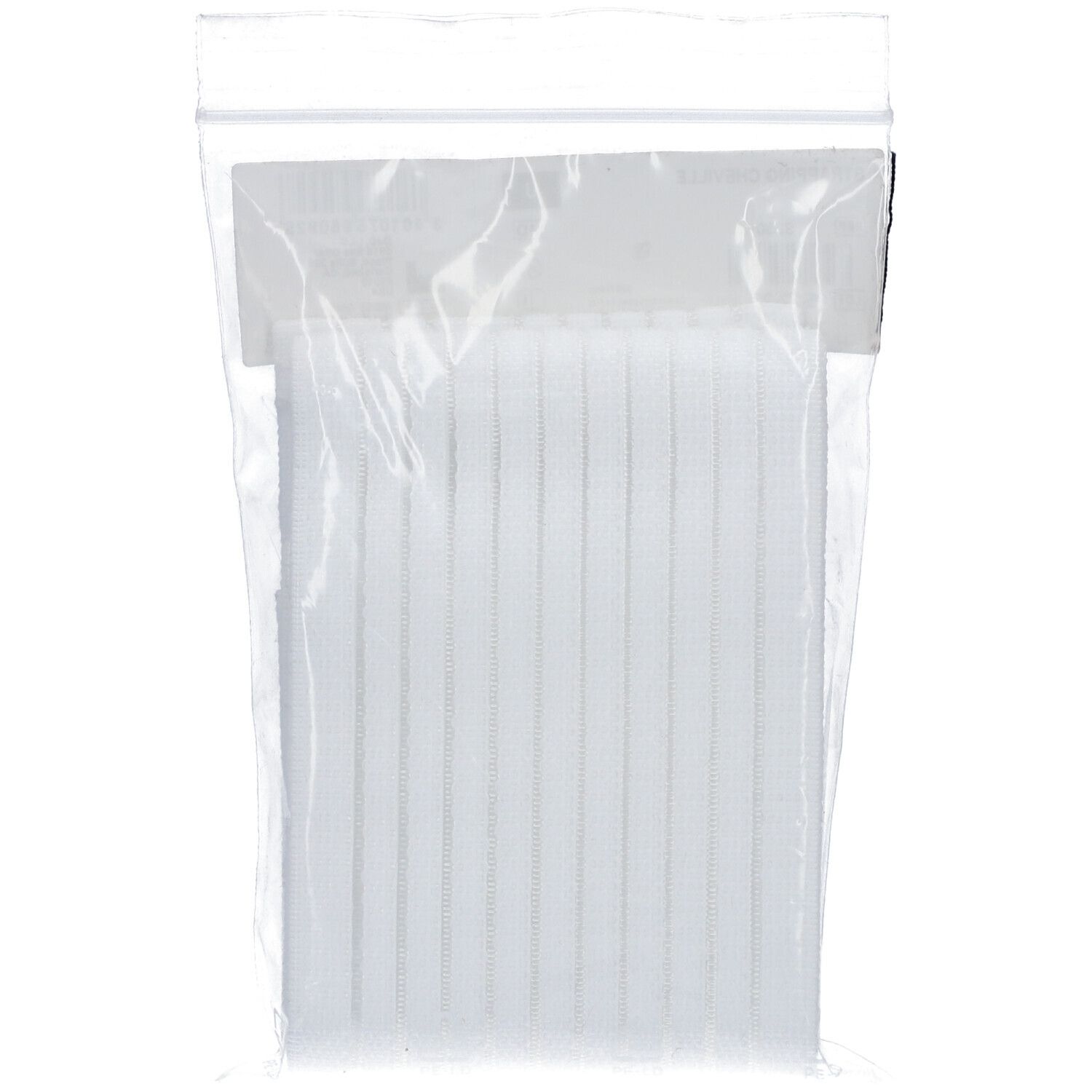 DonJoy Strapping Cheville, blanc, dans un emballage plastique. Produit sans étiquette, seul le produit blanc est visible.
