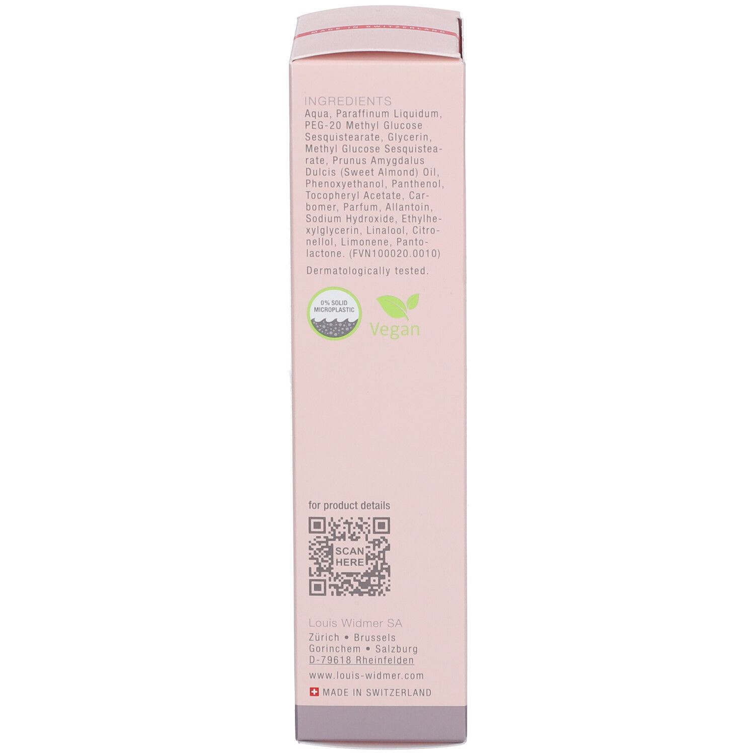 Roze verpakking. Ingrediënten, QR-code, vegan zegel. Opschrift: Dermatologisch getest.