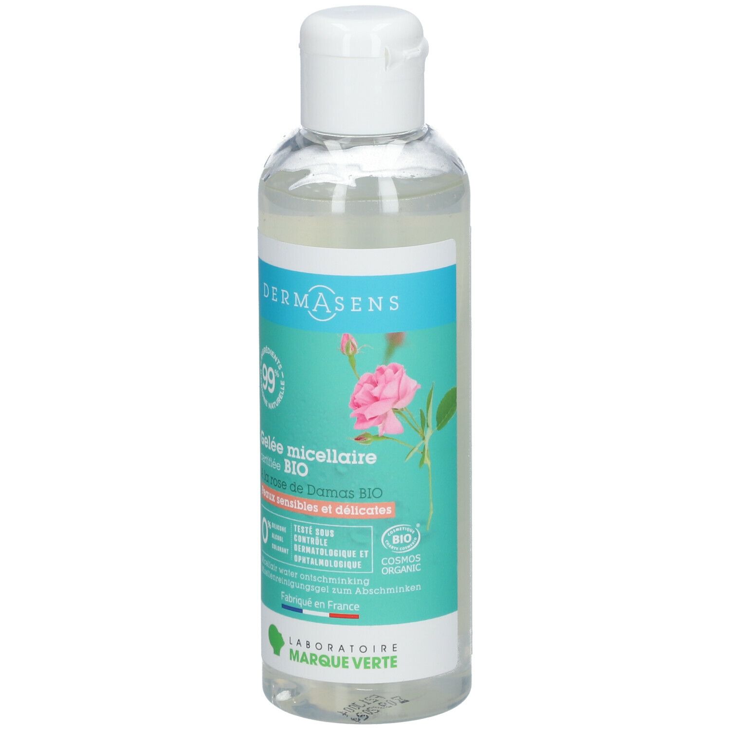 Flacon transparent avec bouchon blanc. Étiquette avec nom du produit, rose et certifications. Marque: DermAsens.