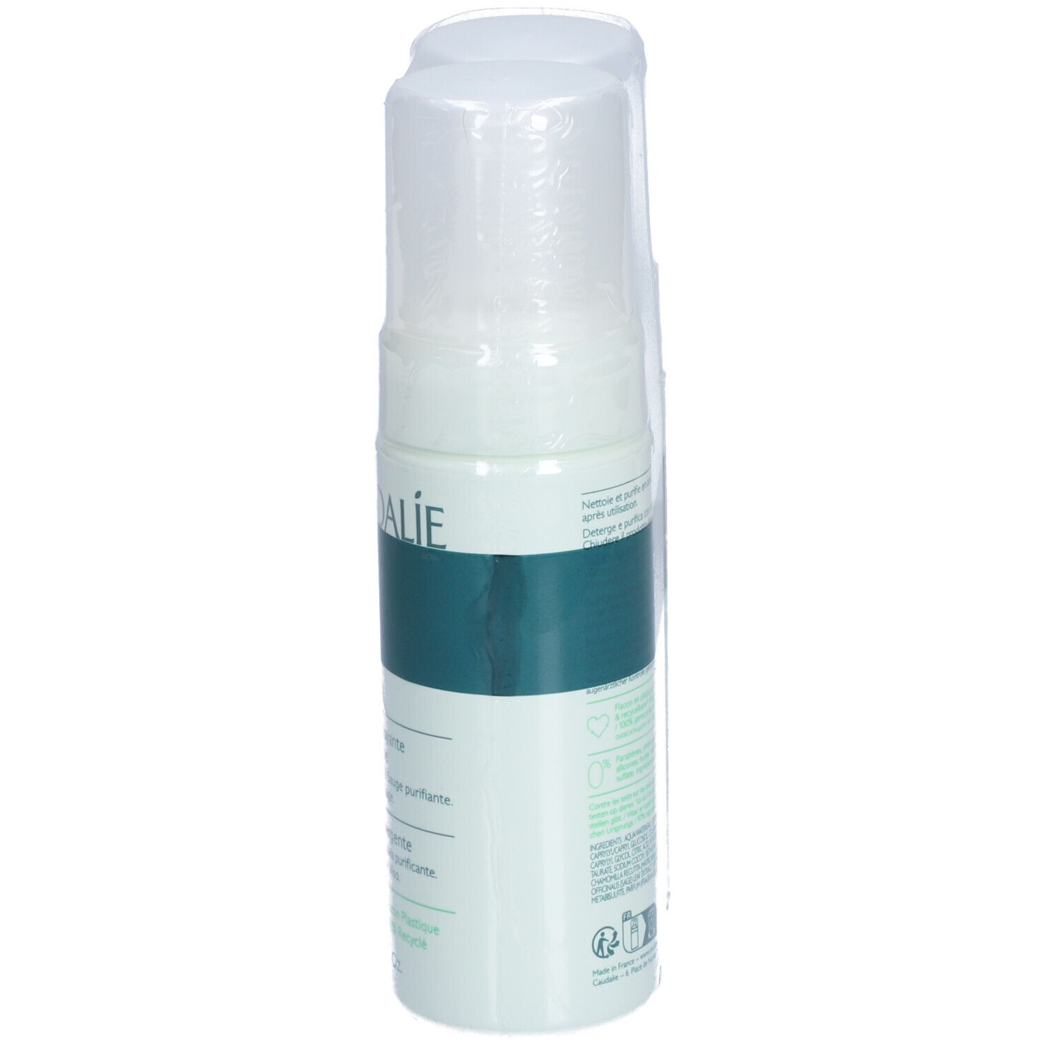 Eine Caudalie Vinoclean Flasche, verpackt. Aufschrift: Vinoclean, Mousse Nettoyante. Flasche mit weißem Deckel und grüner Schrift.