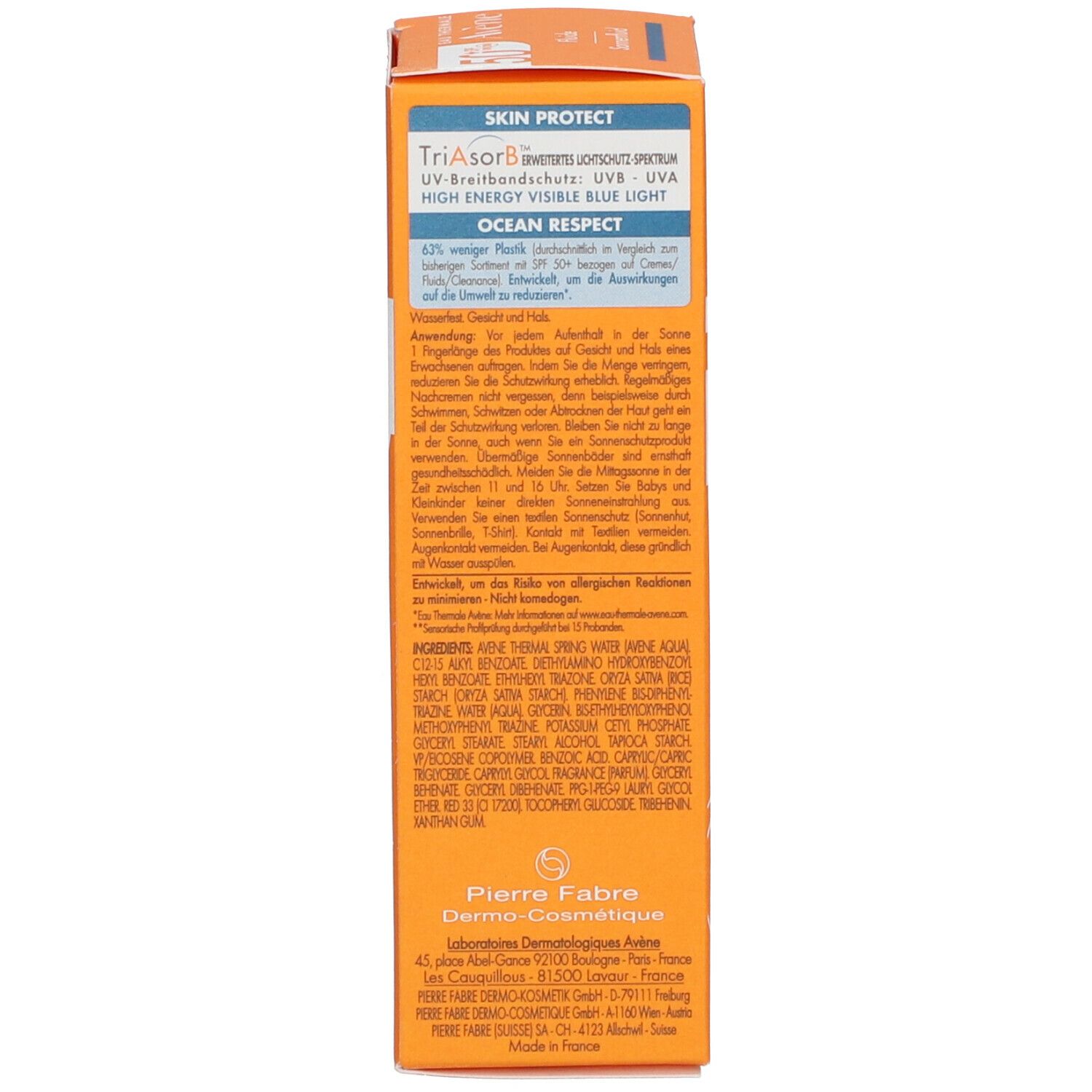 Achterkant van de Avène Sonnenfluid verpakking. Meertalige tekst. Ingrediënten, waarschuwingen, Ocean Respect.
