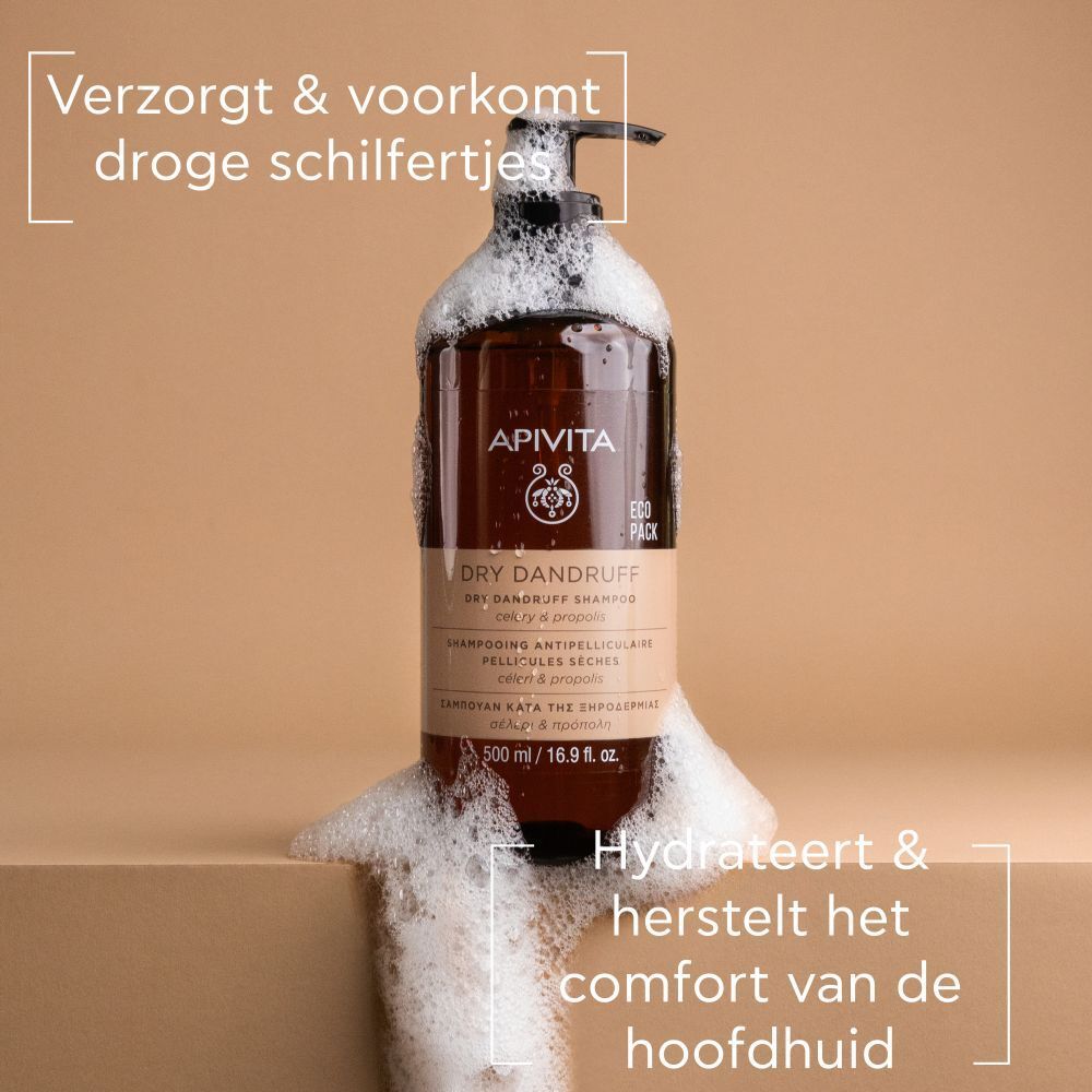 Product met schuim. Tekst: Verzorgt & voorkomt droge schilfertjes. Hydrateert & herstelt de hoofdhuid.
