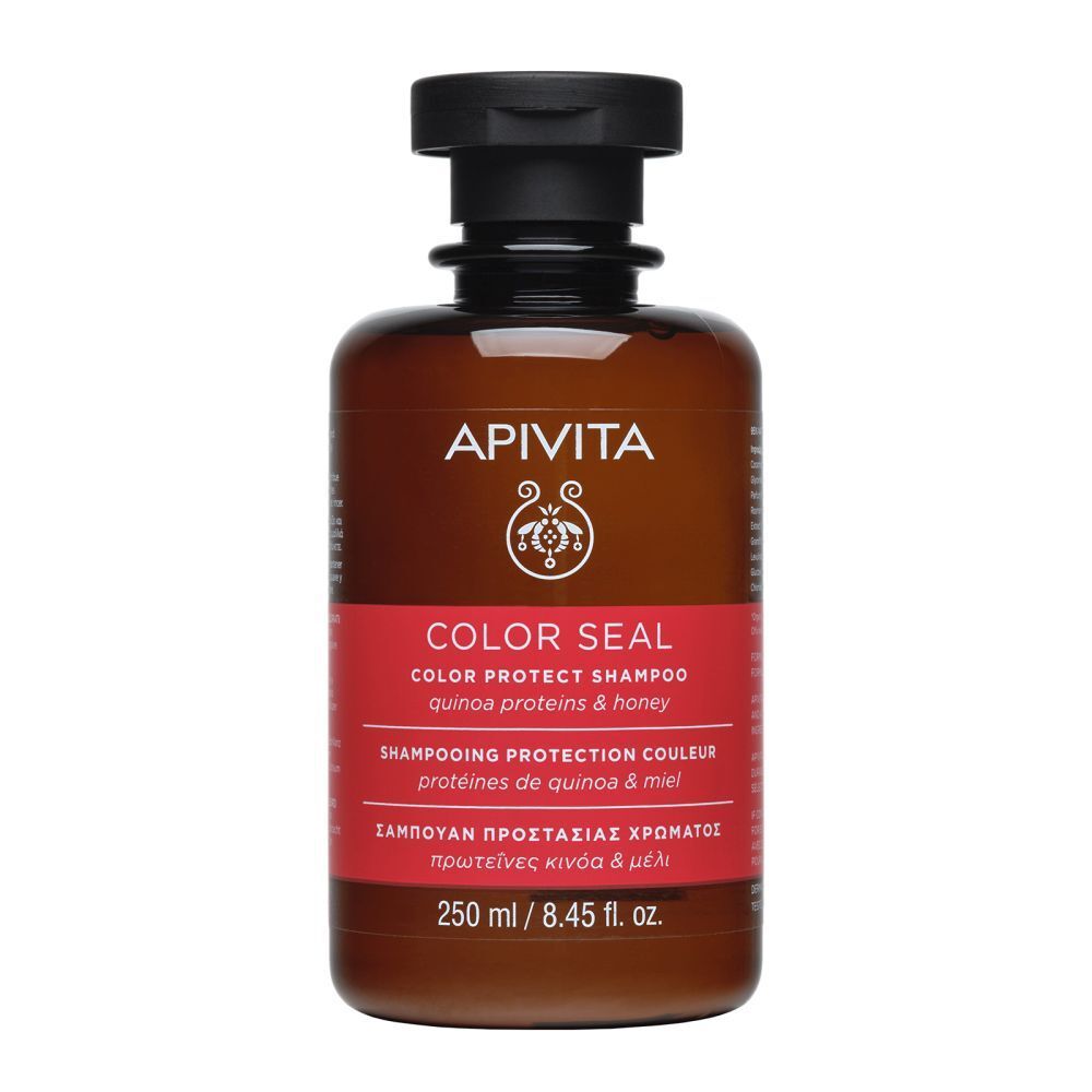 Bruine fles, zwarte dop. Rood etiket: COLOR SEAL, Shampoo. 250 ml. Op quinoa zaden.