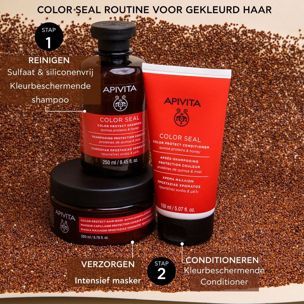 Drie producten: shampoo, conditioner en haarmasker. Op quinoa zaden. Rood etiket, zwarte dop.