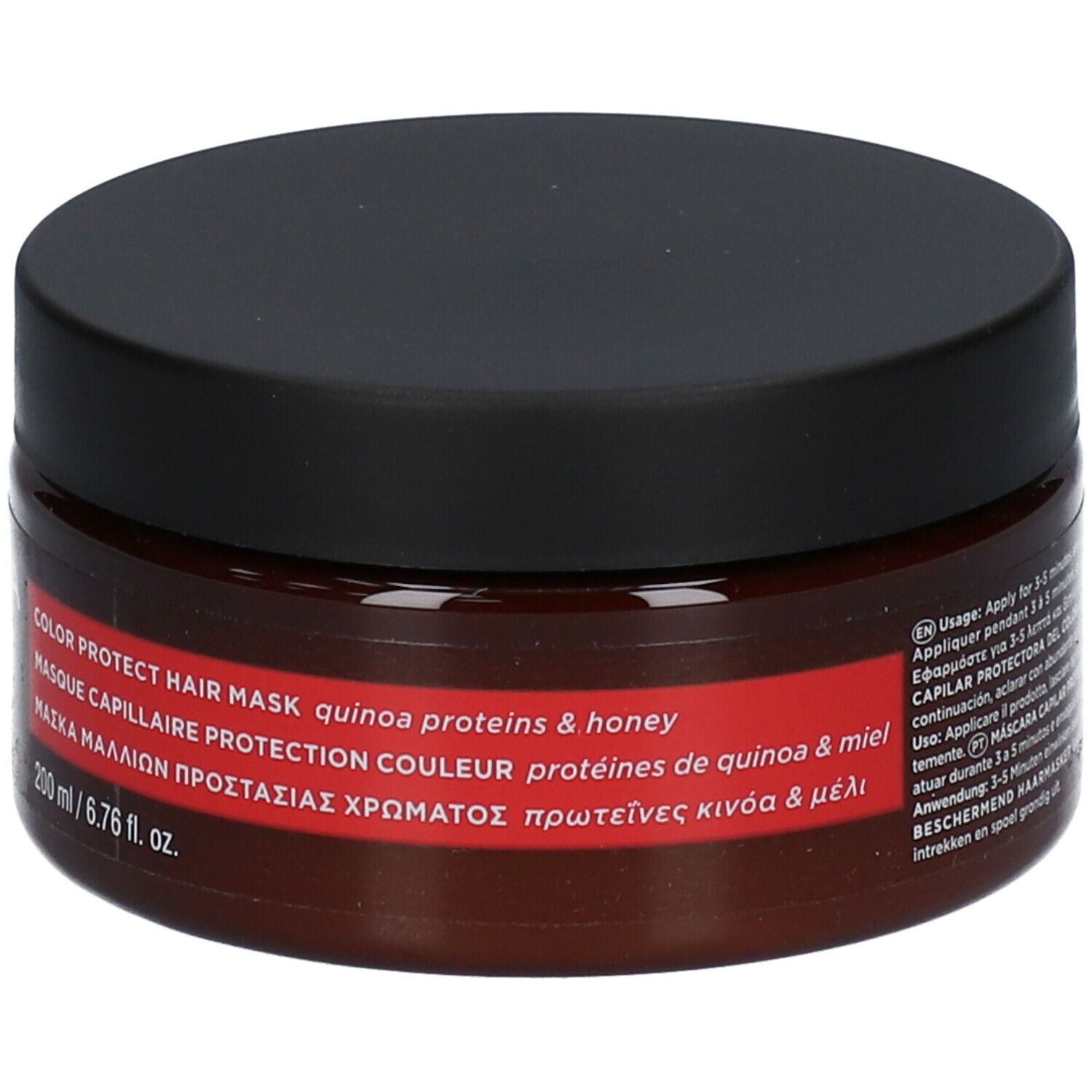 Ronde pot met zwarte deksel. Opschrift: APIVITA Color Protect Hair Mask. Bruine pot met rood etiket.