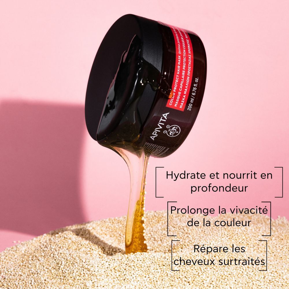 Pot rond avec couvercle noir. Inscription : APIVITA Color Protect Hair Mask. Pot brun avec étiquette rouge.
