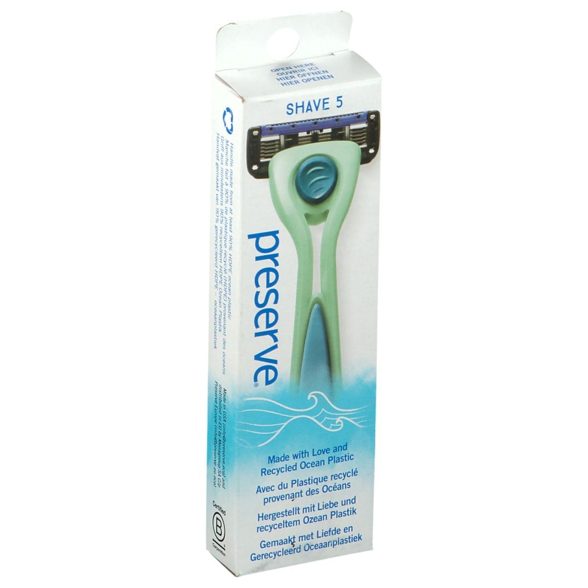 Groen scheermes in verpakking. Merk: preserve. Product: SHAVE 5. Verpakking met golfpatroon en tekst.