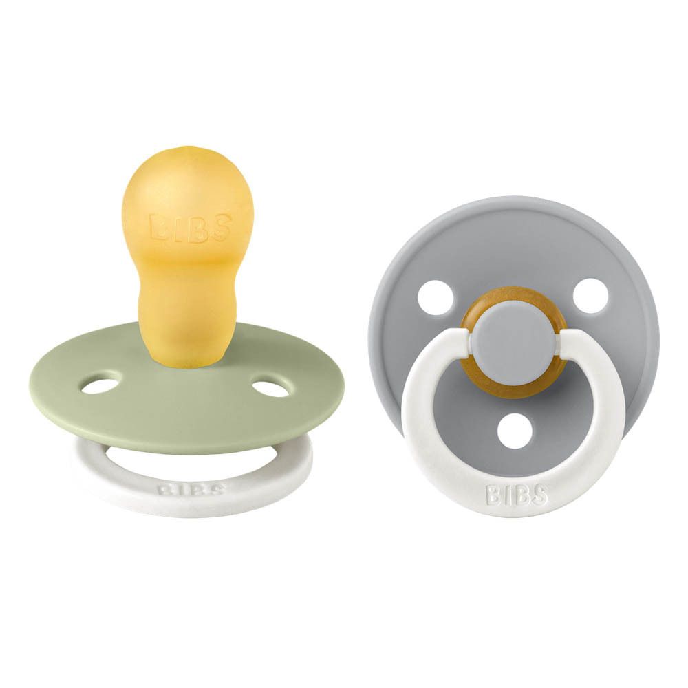 Twee fopspenen, salie en grijs, witte ring, gele speen. BIBS-logo zichtbaar.