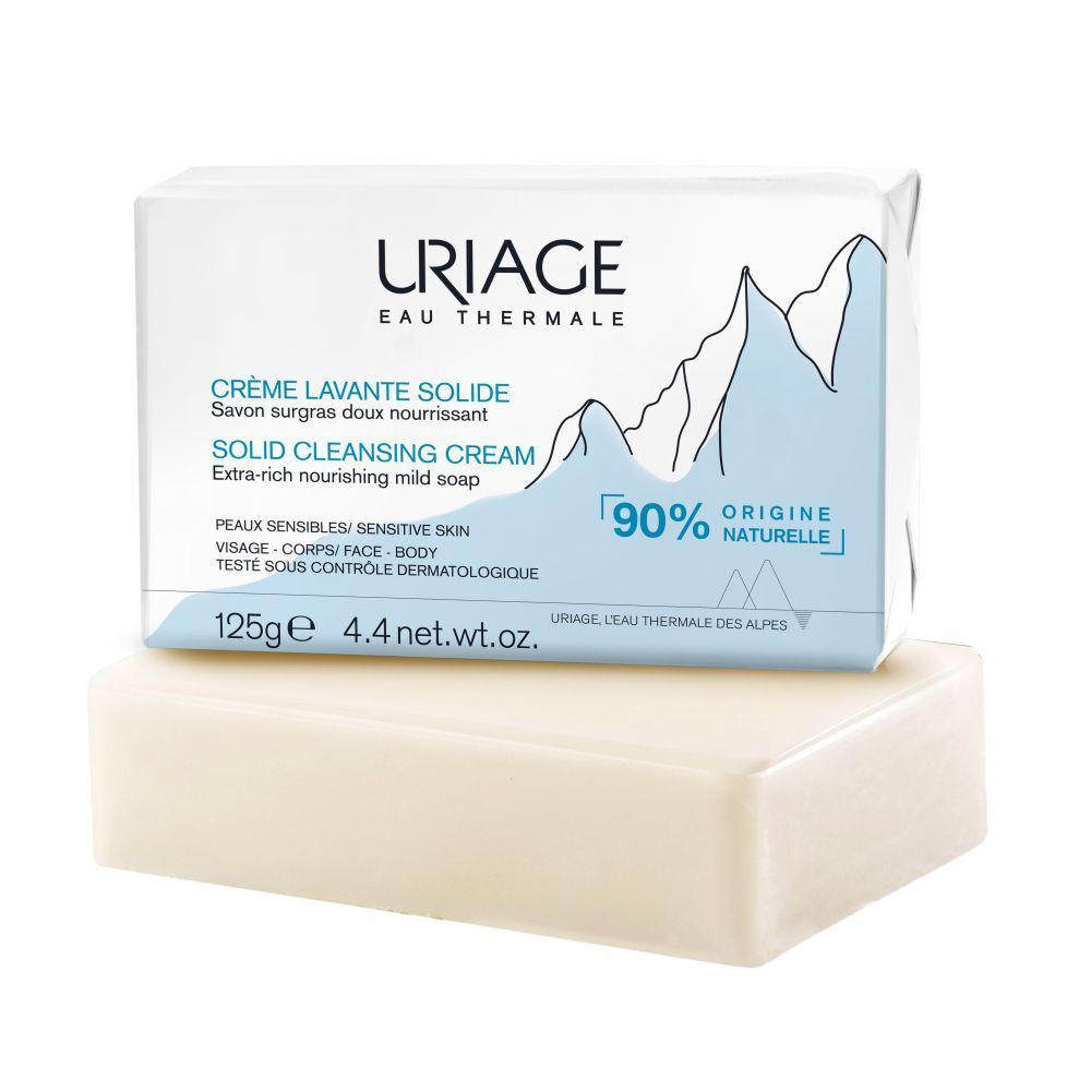 Wit zeepblok en verpakking. Merk URIAGE, tekst: Crème Lavante Solide, 90% natuurlijke ingrediënten.